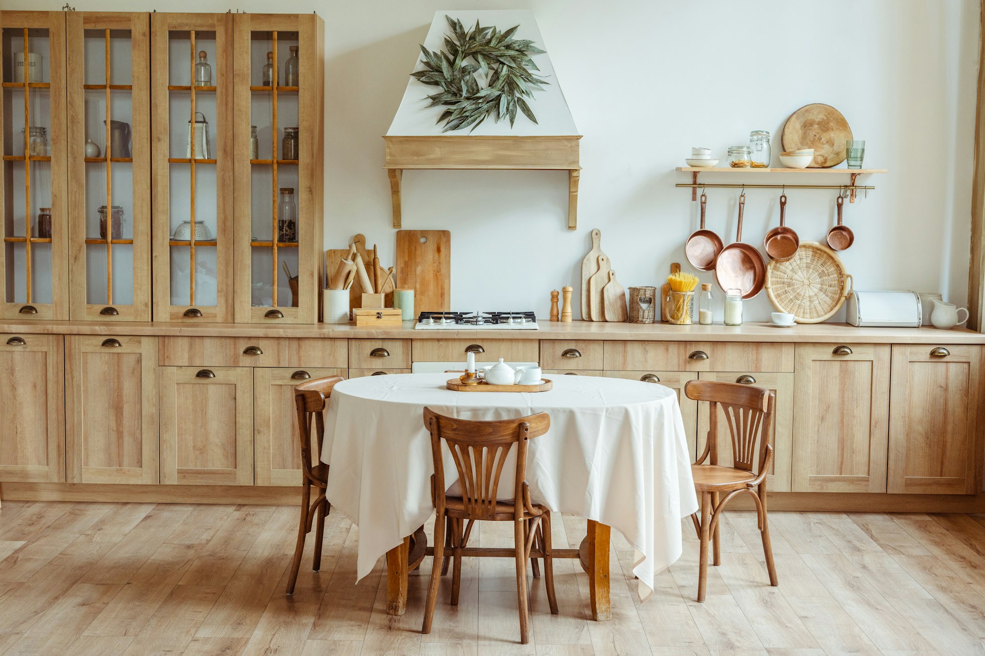 bright-and-airy-farmhouse-kitchen-with-round-dining-table.jpg